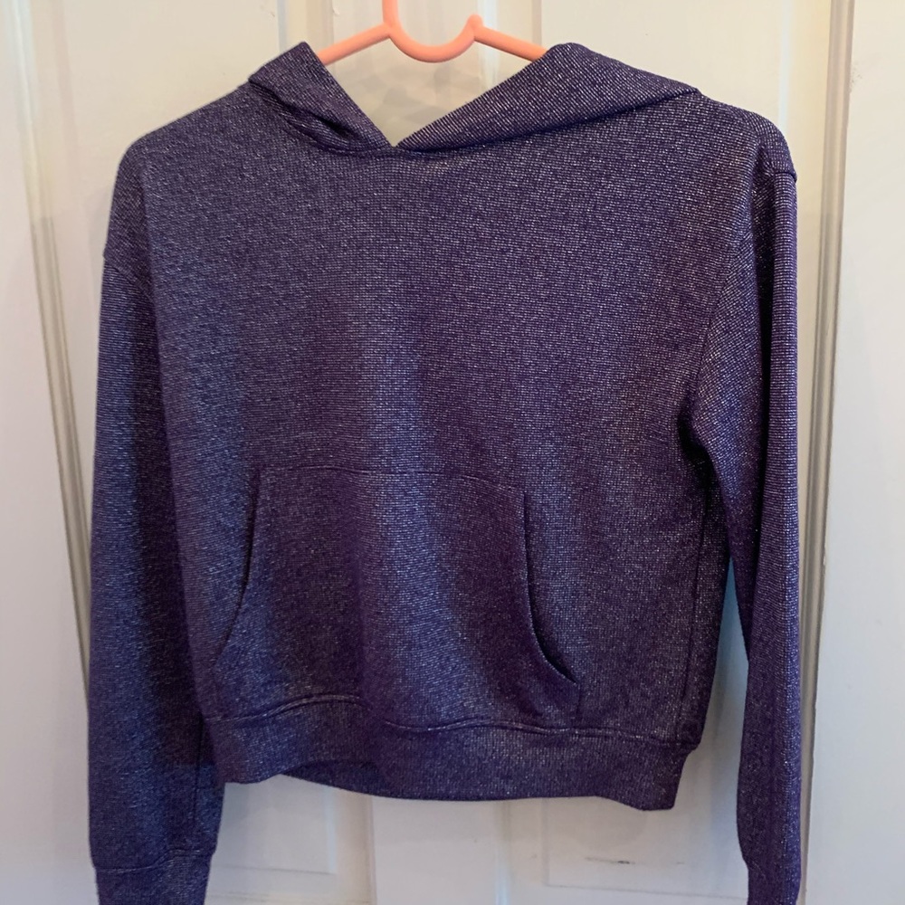 Child’s purple sweater